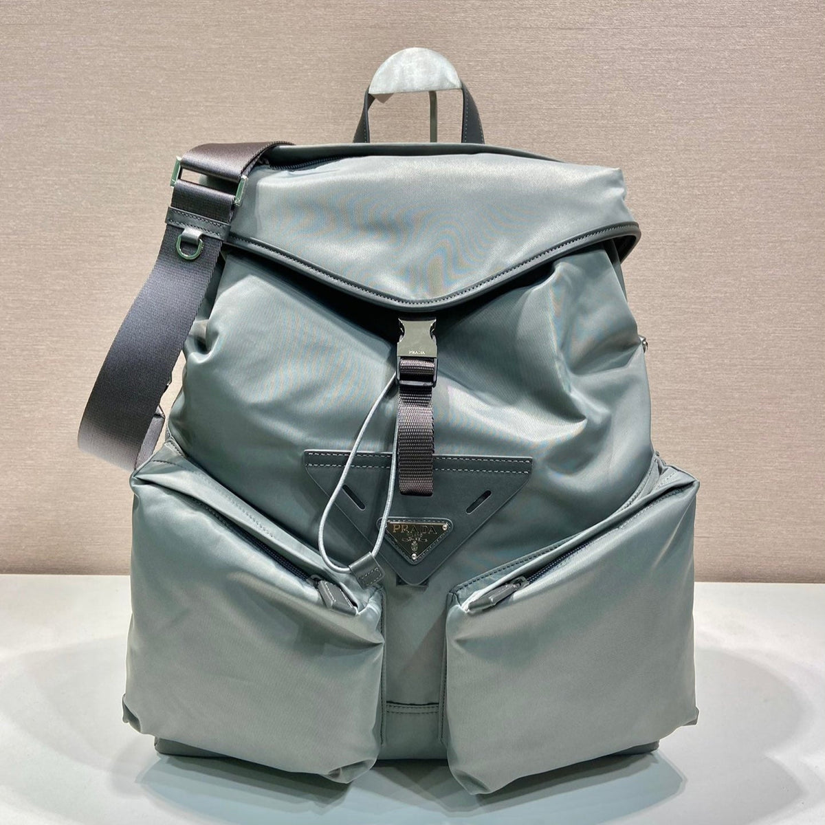 PRADA TRIANGLE LOGO BACKPACK 45 IN ASH GRAY RE-NYLON